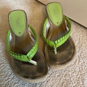 These are green flip-flops can be worn with lots of different things.